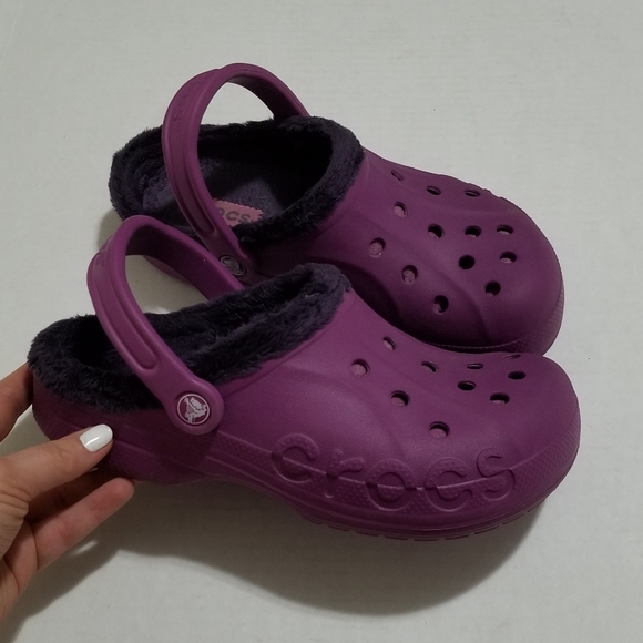 purple crocs with fur